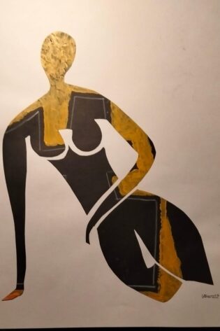 Figura dorada en equilibrio CalleArteMas