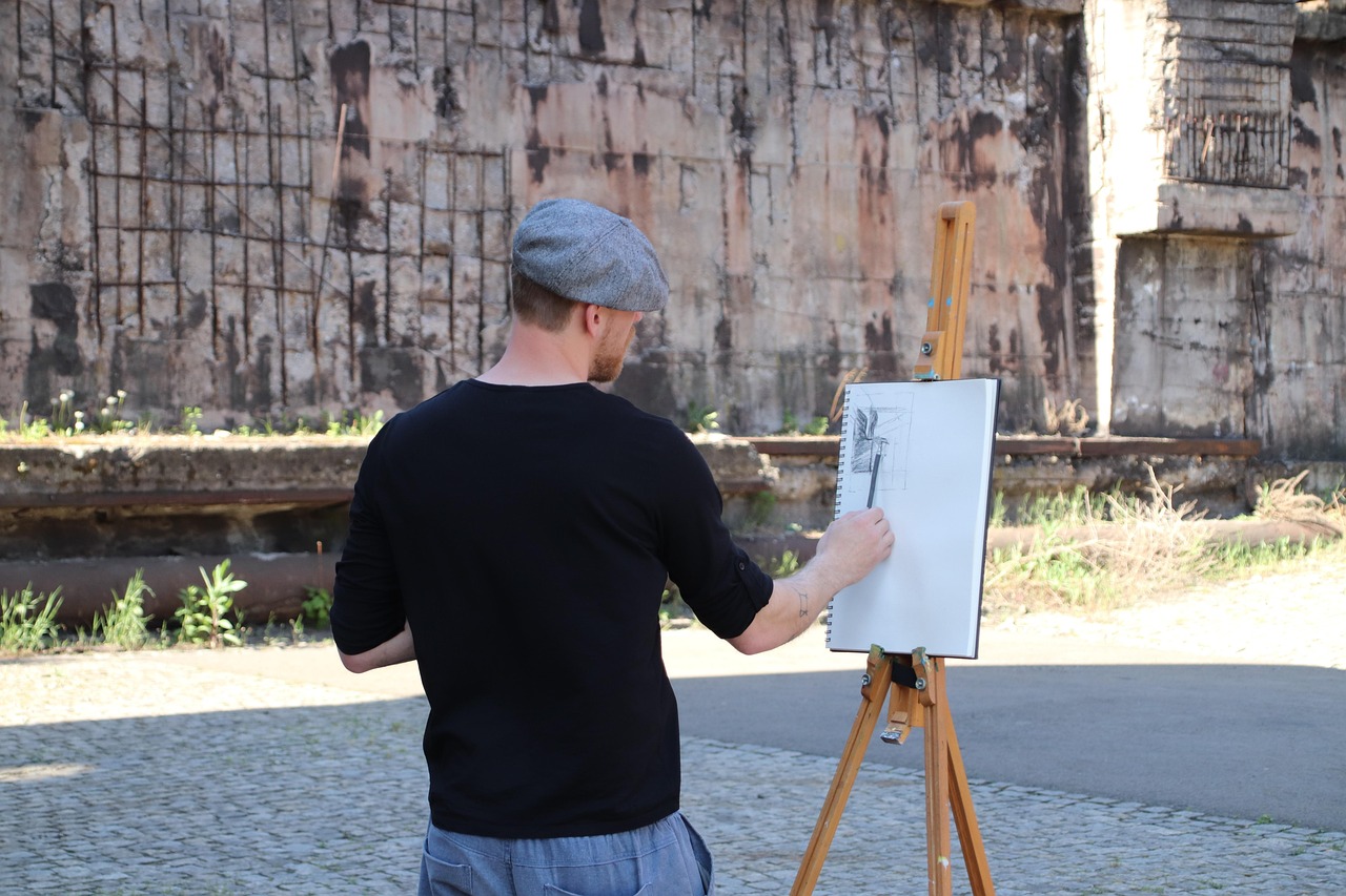 Artista pintando: arte humano frente a inteligencia artificial